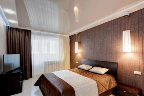 Как выбрать натяжной потолок в спальню. Виды натяжных потолков для спальни