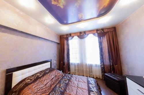 Как выбрать натяжной потолок в спальню. Виды натяжных потолков для спальни