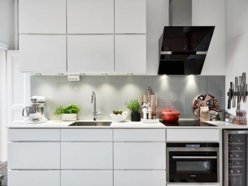 Расположение светильников на натяжном потолке на кухне. Общие рекомендации по освещению кухни